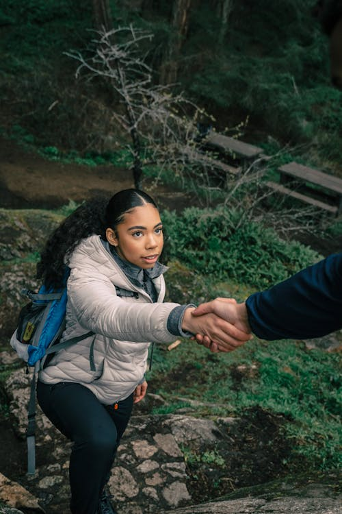  a person helping another