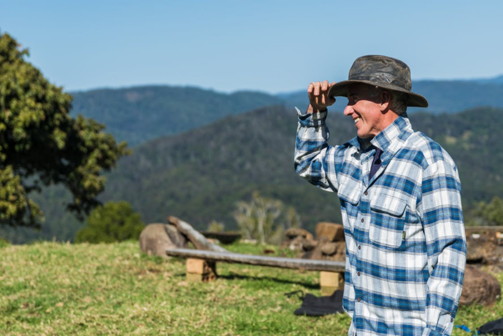 a farmer looking at his crops