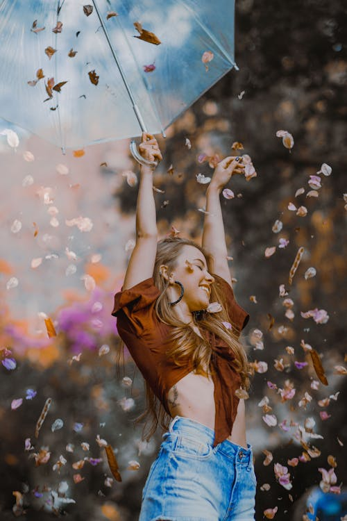 a happy person holding an umbrella