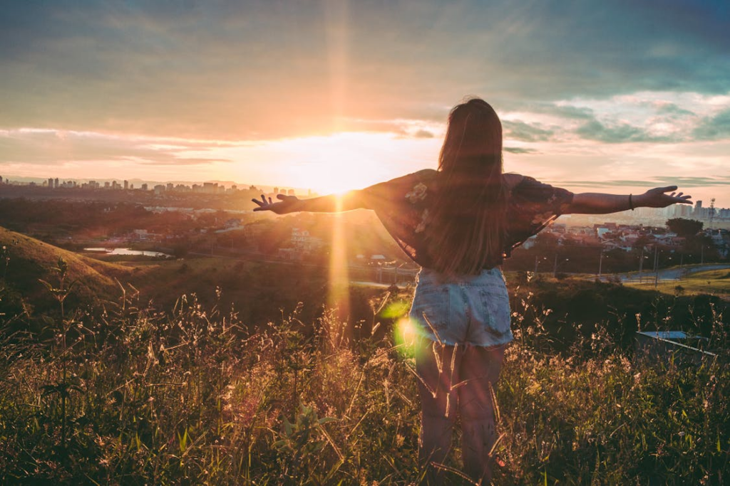 a person feeling the sunshine