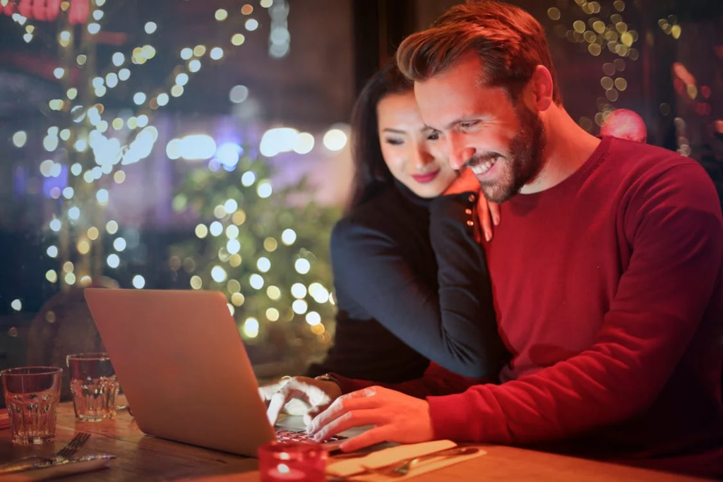 a couple looking at a screen