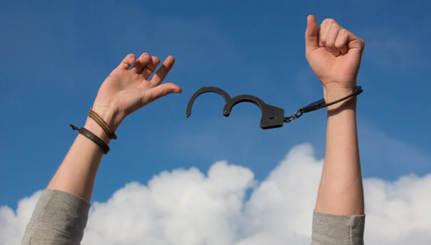 A person breaking free from restraints