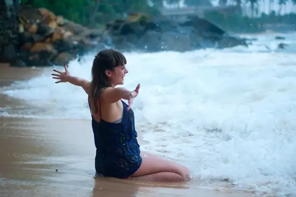 a person playing near the sea