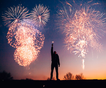 A person lighting fireworks