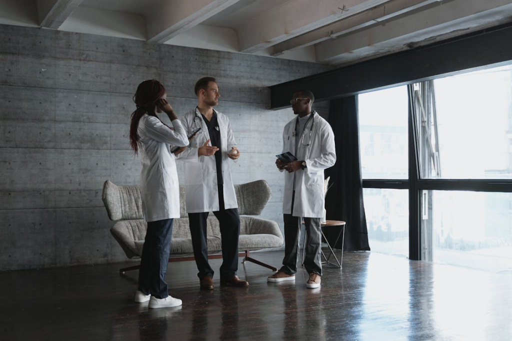A group of physicians engaged in a discussion.